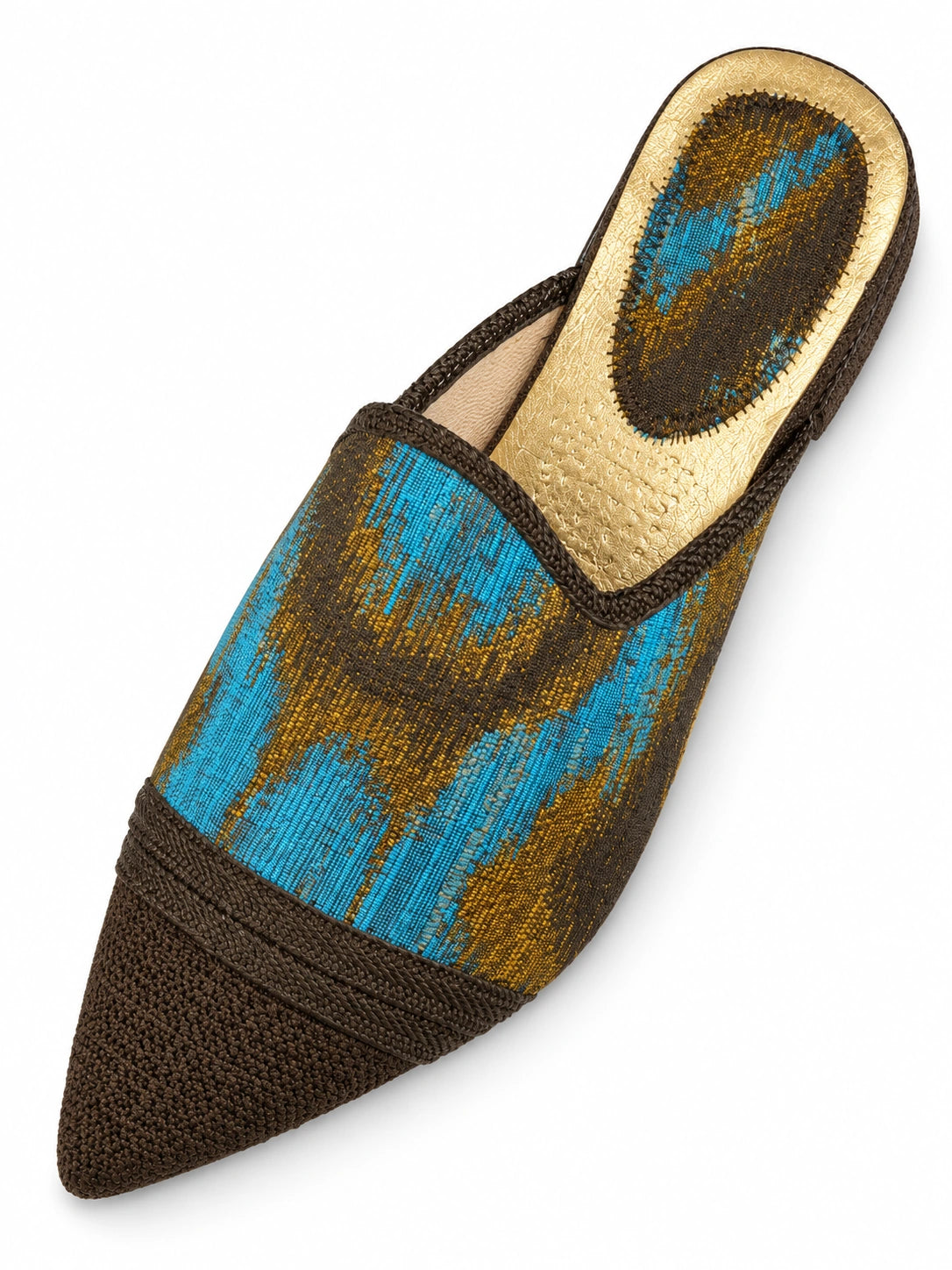 Babouche with turquoise-blue, brown and gold-tone abstract pattern, a dark brown pointed toe and matching braid on white.