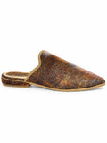 Side view of a brown mottled babouche with copper and grey flecks, gold-tone braid and a low covered heel on white.