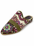 Burgundy, cream and green ornamental babouche with pink and teal floral motifs and an olive braided band on white.