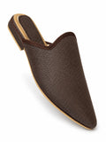Chocolate brown pointed-toe babouche with a fine woven texture and matching braided edging on white.