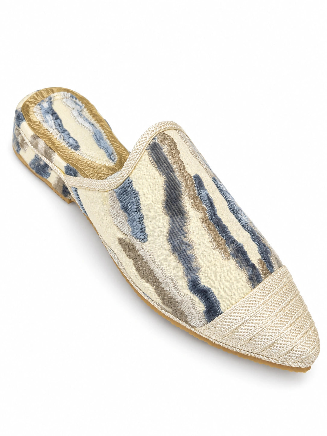 Cream babouche with blue-grey and taupe textured stripes, an ivory braided toe cap and open back on white.