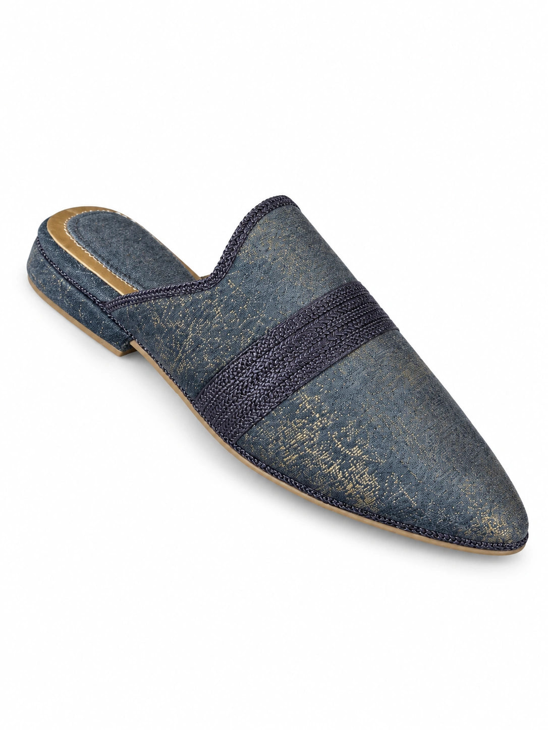 Dark slate-blue babouches with fine gold-tone mottling and a wide navy braided band, on a white background.
