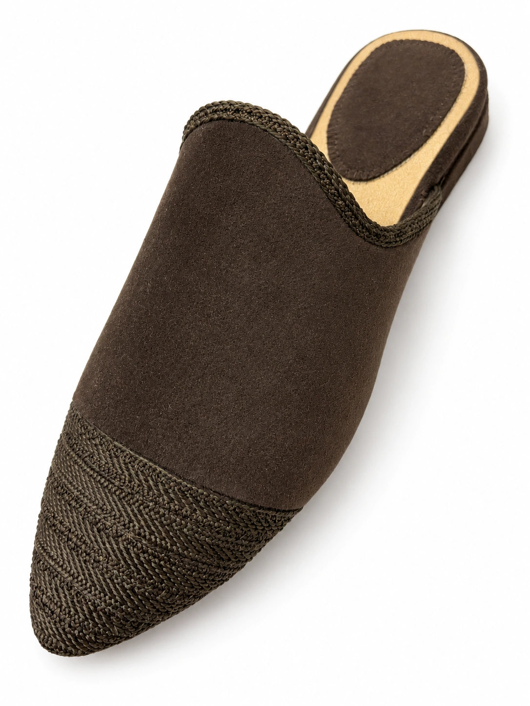 Dark brown babouche with tonal braided edging and a textured braided pointed toe, shown on white.