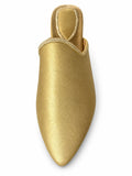Gold-tone babouche with a plain finely grained upper and pale braided edging on a white background.