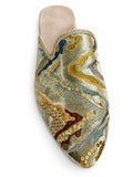 Pale blue-green ornamental babouche with gold, dark blue and rust motifs, gold sequins and metallic braided trim on a white background.