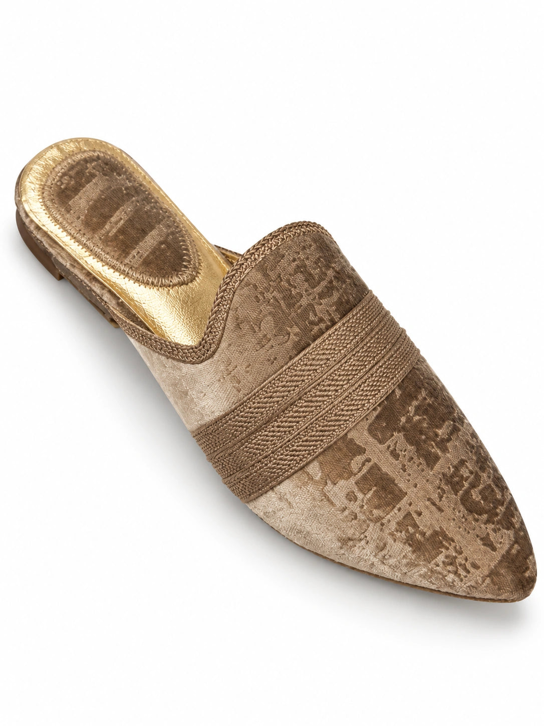 Taupe babouches with a tonal geometric pattern and a wide braided band across the upper, on a white background.