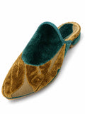 Teal and antique-gold patterned babouche with raised leaf-like motifs, teal braided edging and open back on white.